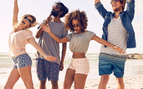 people dancing on beach