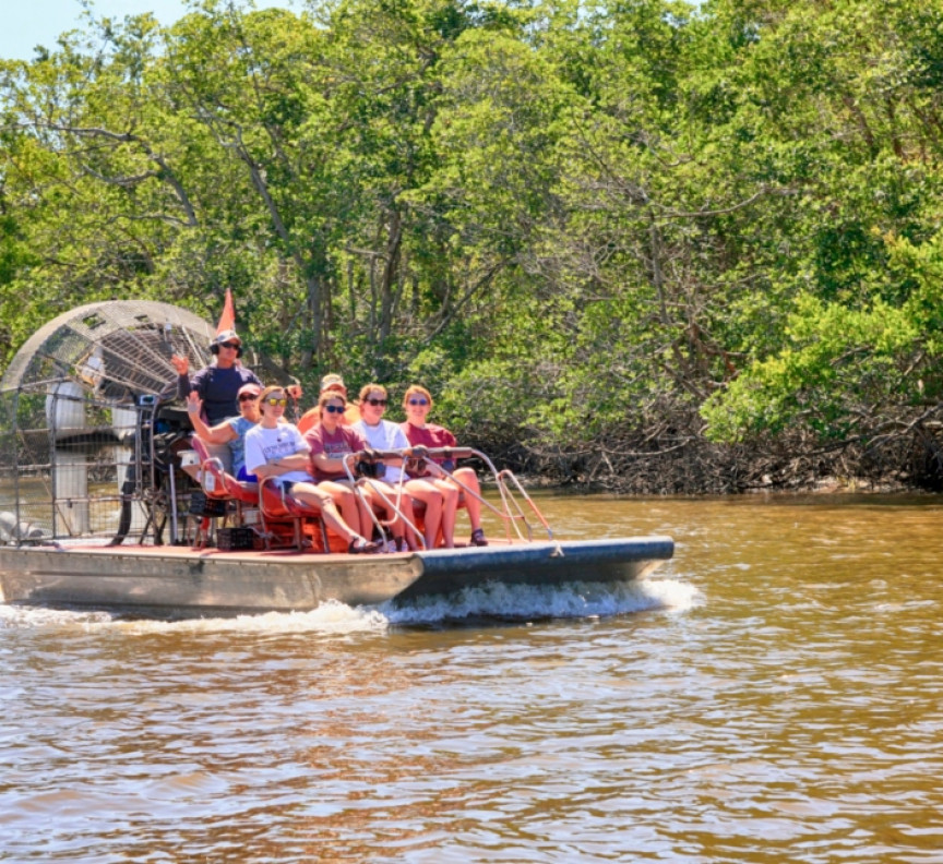 airboat with tourists in everglades