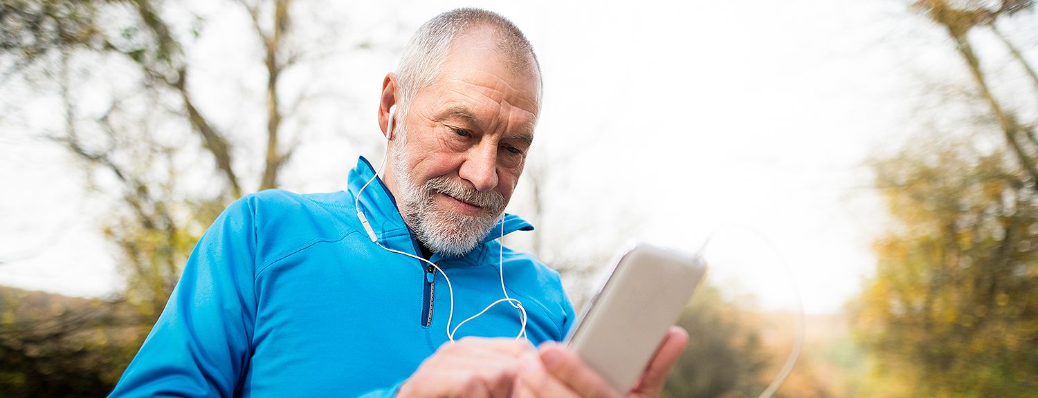 Man using phone in the wilderness