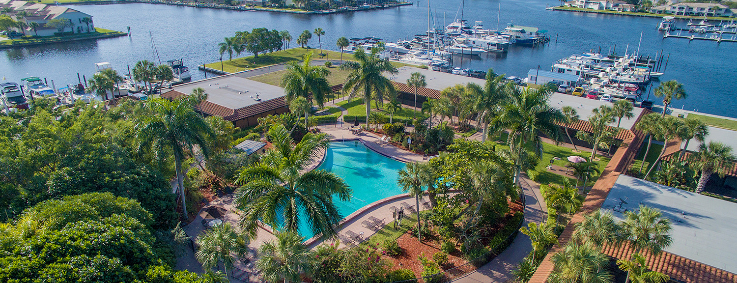 Aerial view of hotel, pool & marina 
