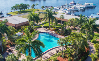 Aerial view of hotel, pool & marina