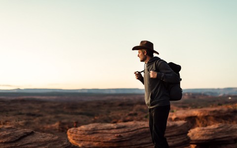 man hiking in arizona canyons