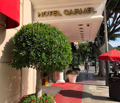 entrance to hotel carmel on sunny day