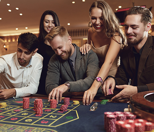group of friends playing at the casino