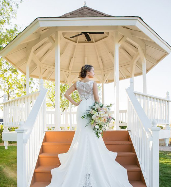 gazebo with a bride walking up the stairs