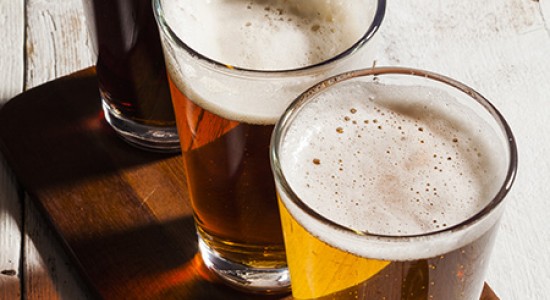 Flight of beer on wooden board