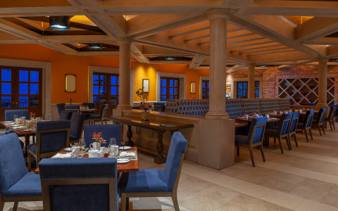 restaurant seating with blue chairs