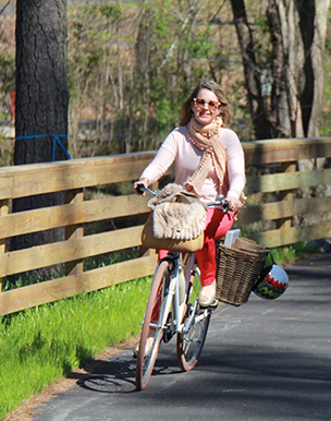 a woman riding a bicycle  
