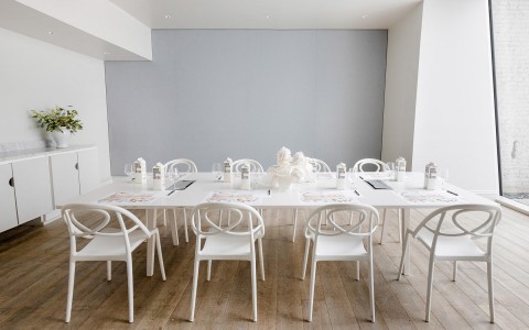 A big white dining table