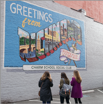 quirk richmond mural with 3 girls standing in front of it