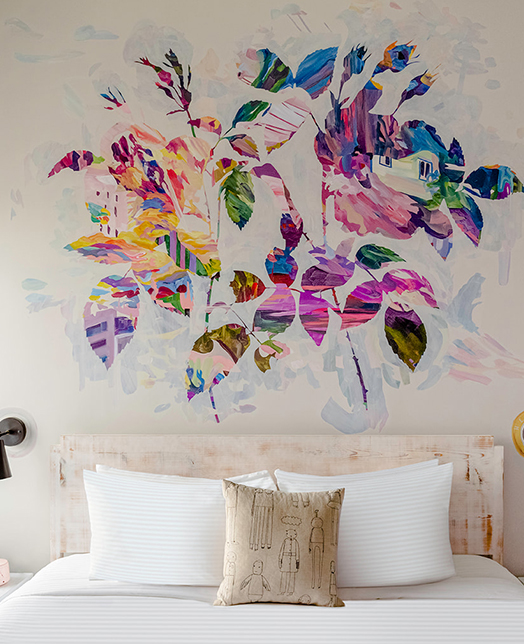 View of a colorful leaves painting on a wall