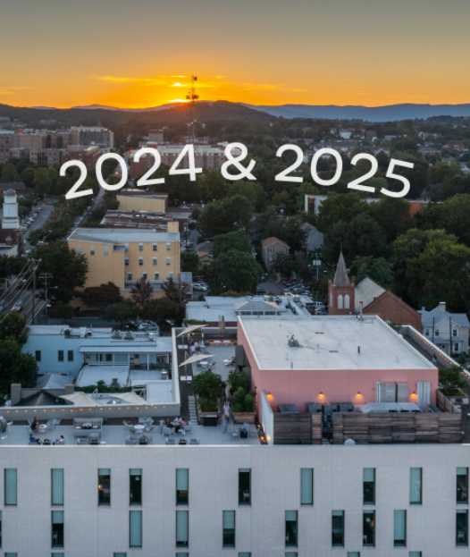 View of a hotel exterior with a "2024 & 2025" verbiage