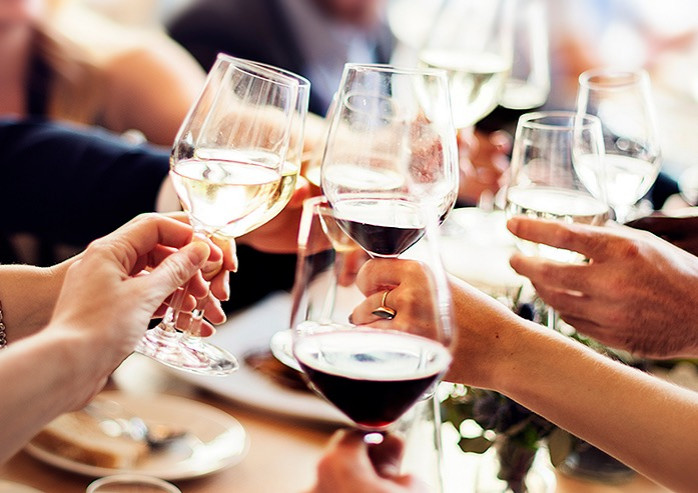 friends toasting with wine