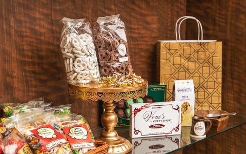 variety of pretzels and popcorn displayed on table 