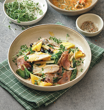 colorful dish of pasta with vegetables served in a bowl