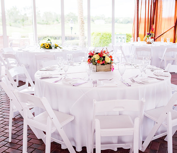 a table and chair setup for an event
