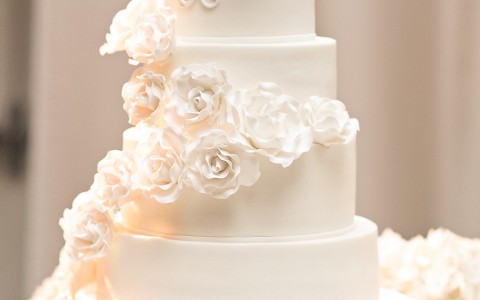 three tiered cake with floral decorations