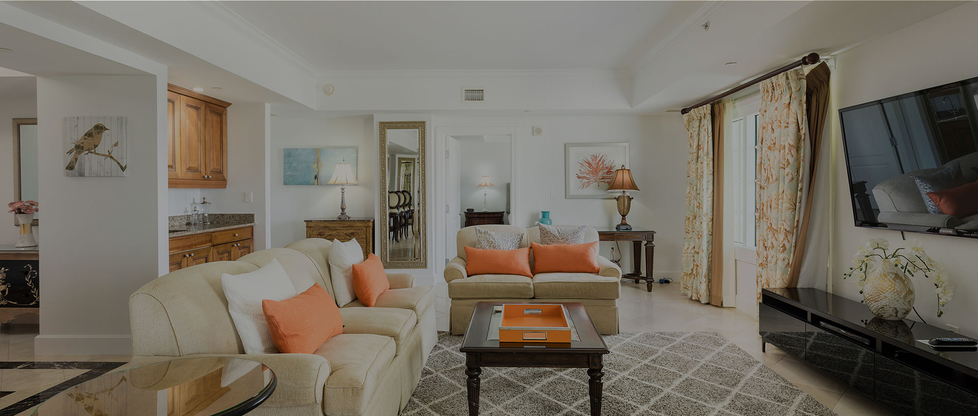 living room with orange accents dark overlay