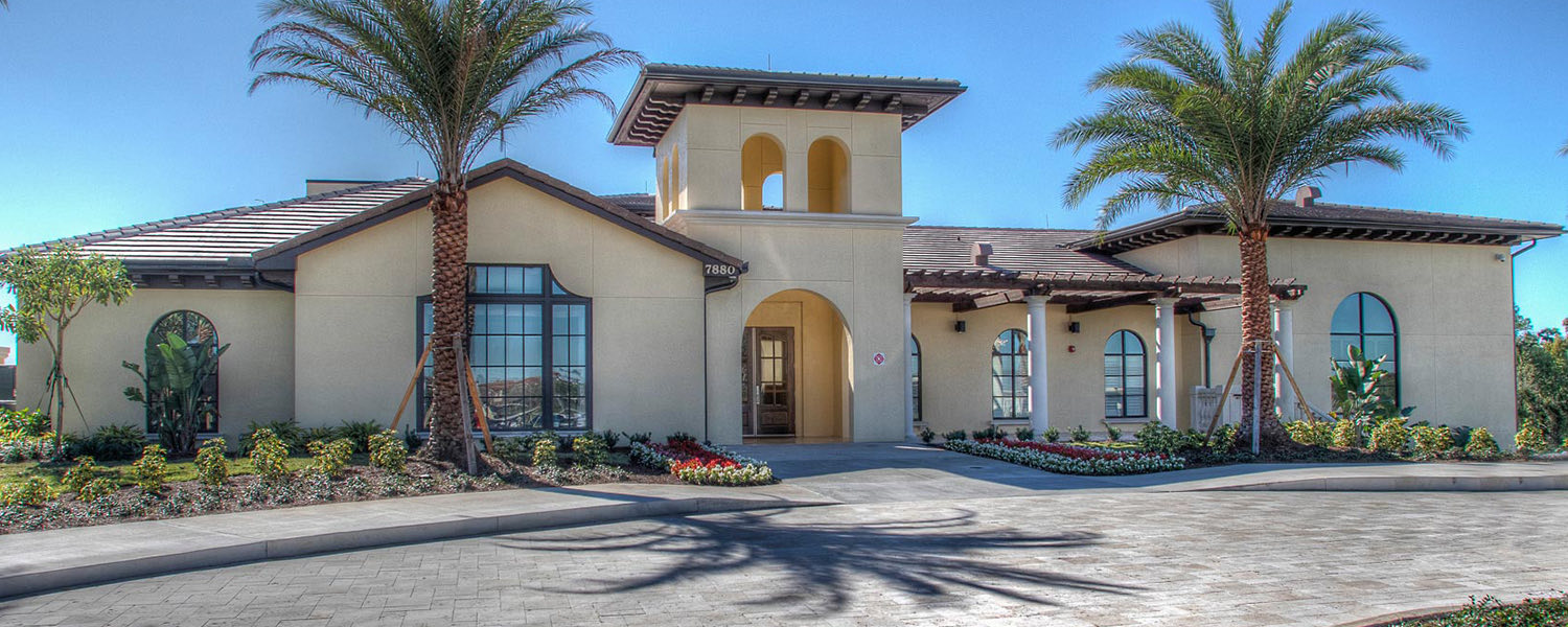 large white exterior of building in spanish style
