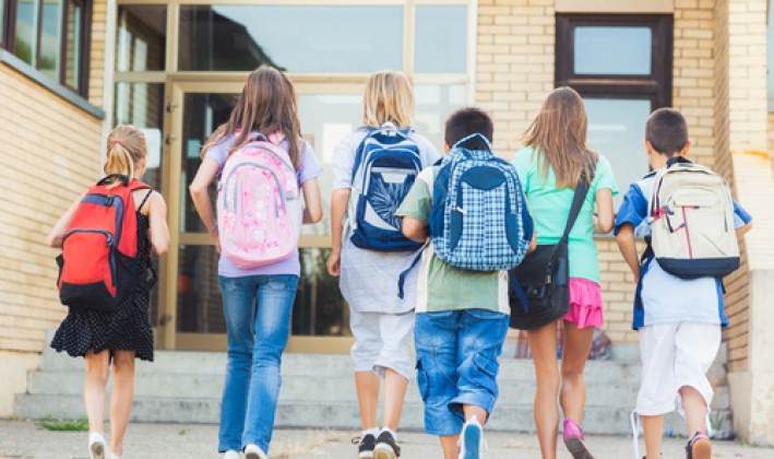children with backpacks