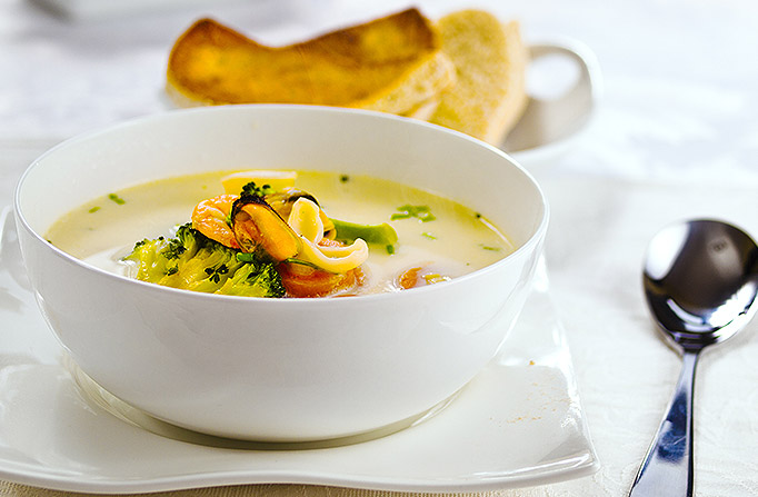 Fish Chowder with veggies & slices of bread on the side