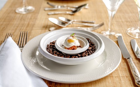 exquisite dish on a table with silverware