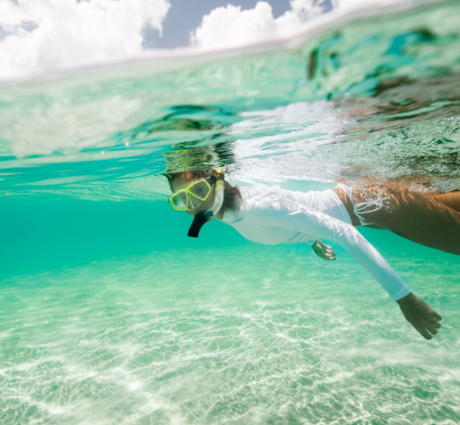 View of girl snorkeling in the ocean