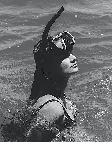 black and white image of a woman in the water