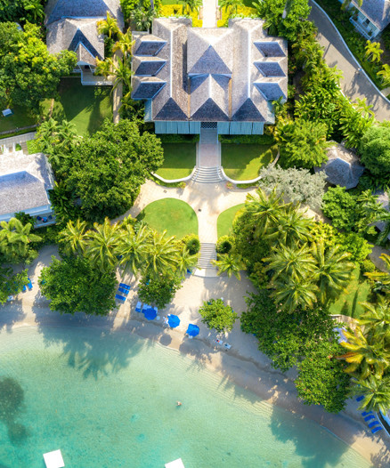 Aerial view of the property next to the beach and a big nature area