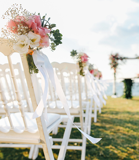 Closeup of some chairs at a wedding ceremony