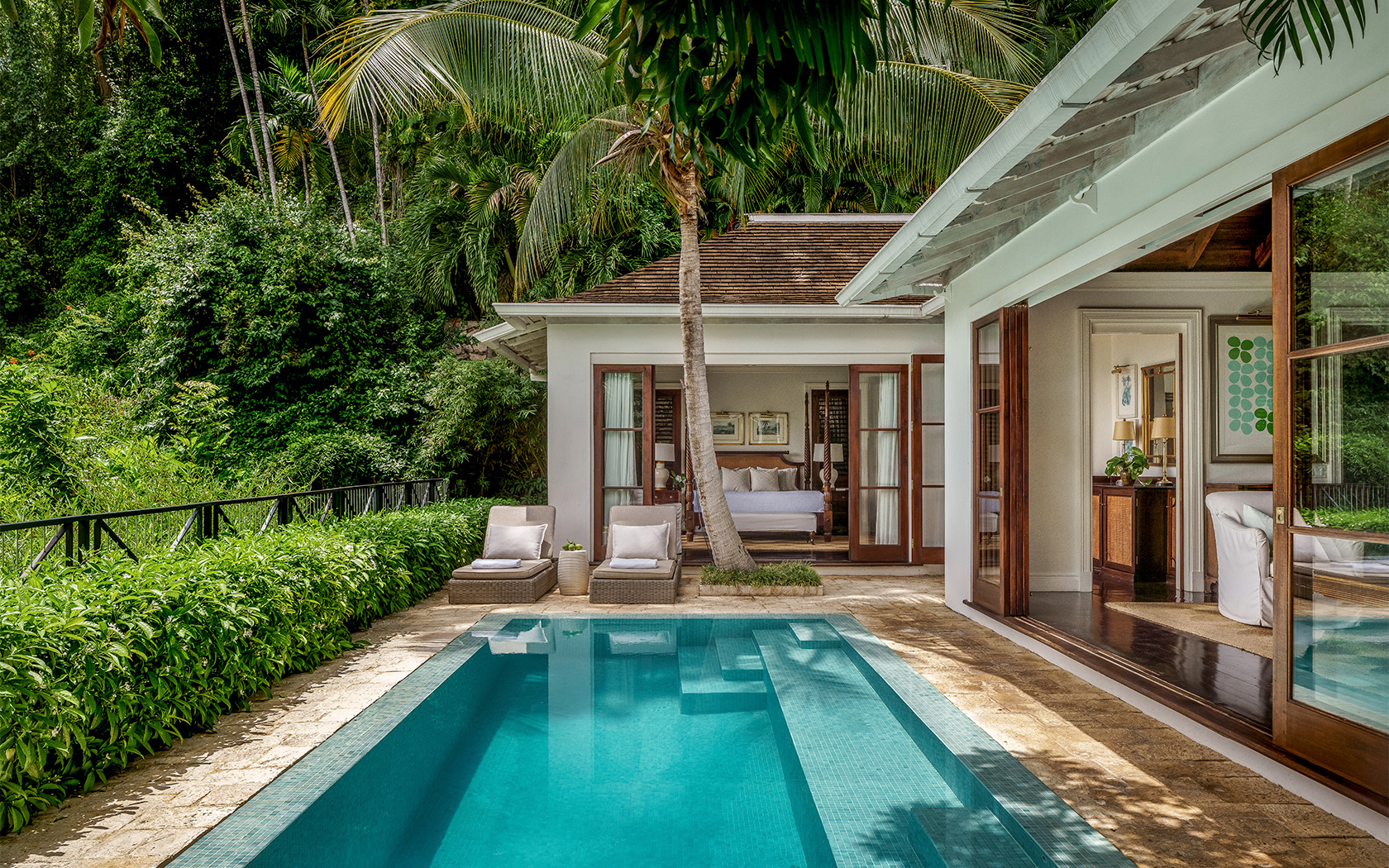 suite with a private pool in tropical jungle