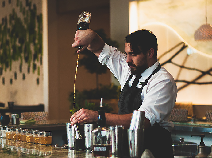 Bartender serving drink