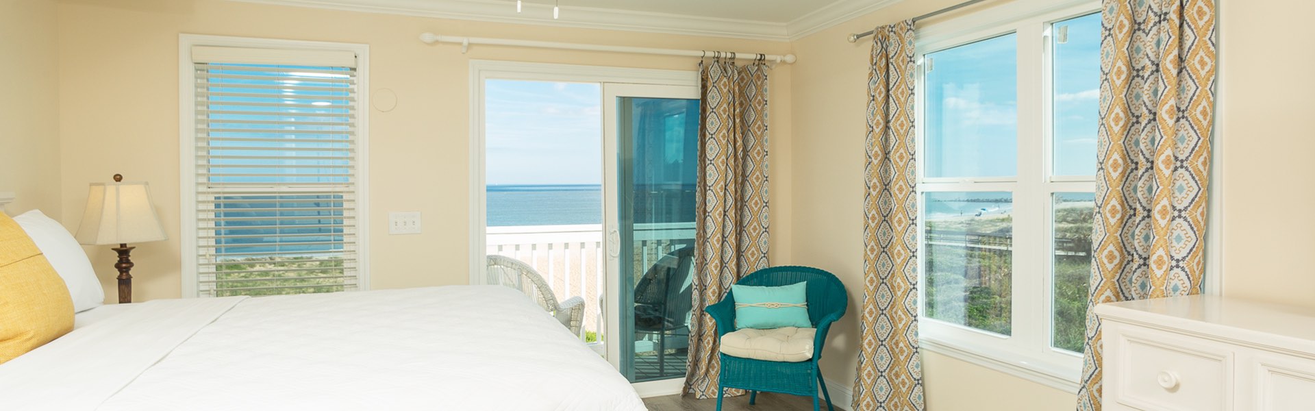 Room with king bed and wide view of ocean