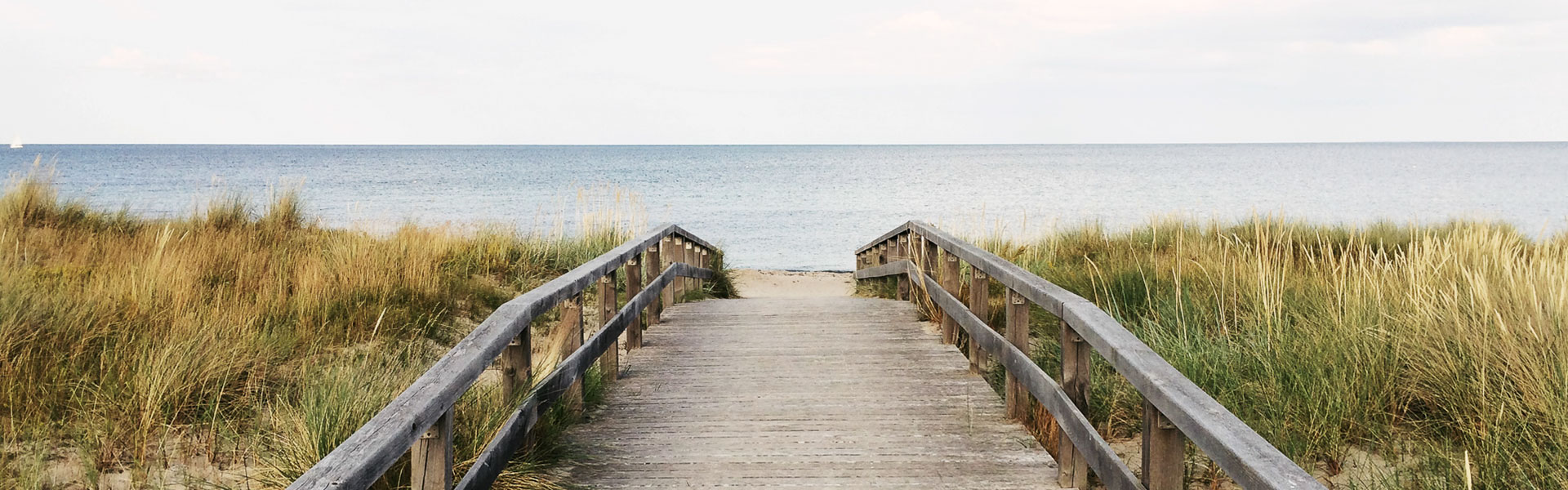 wooden boardwalk leading to beach