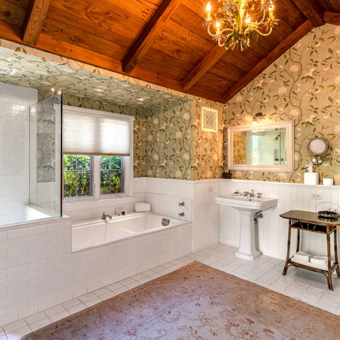 san ysidro oak bathroom with wooden ceiling and floral wallpaper