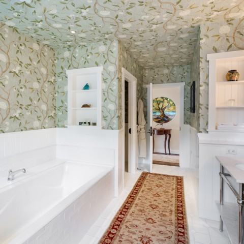 ivy cottage bathroom with bathtub and sink