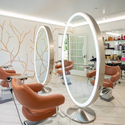 salon with big round mirrors 