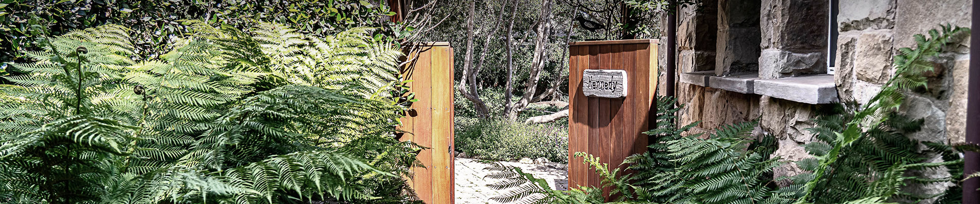 wooden entrances to the san ysidro cottages