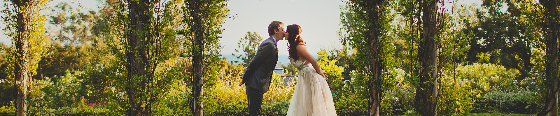 bride and groom kiss