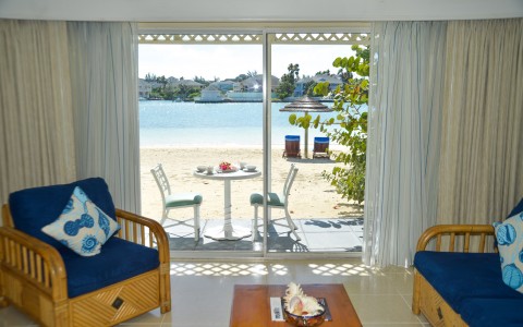 living room area with beach access balcony