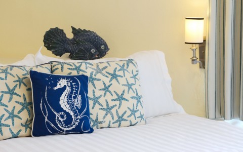 closeup of the bed with starfish pillows