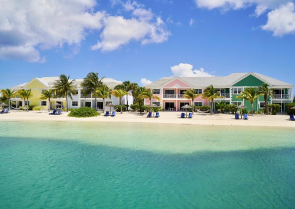 sandyport beach resort lagoon view with colorful houses in background