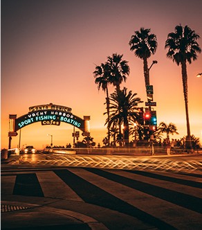 Santa Monica pier sign at sunset