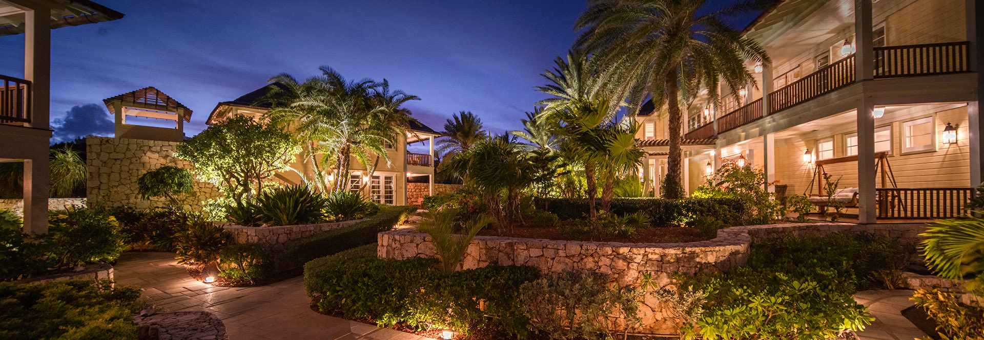 corner exterior view of property at night