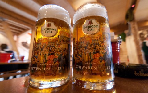 Two glass mugs with beer