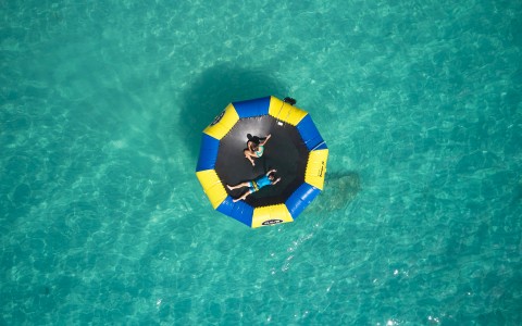 Top view of two people at a big float 
