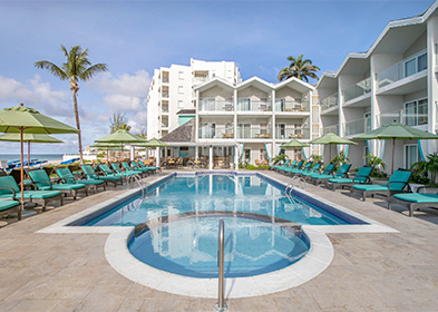 Side view of a big pool at the property