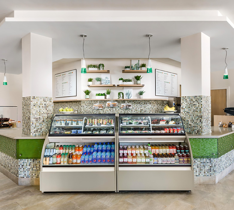 etc. cafe with fridge displaying a variety of beverages