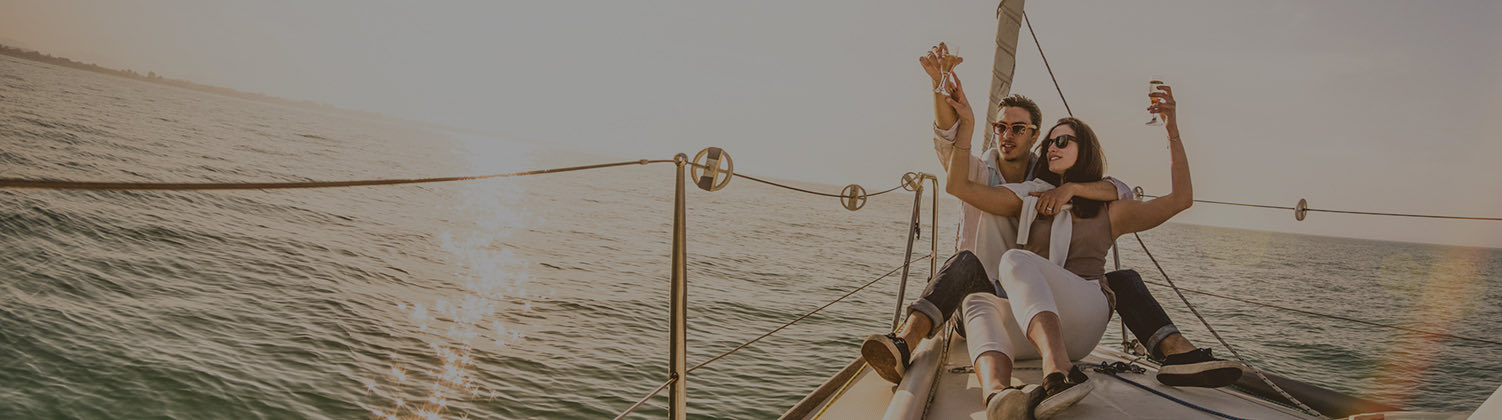 couple enjoying a sunset in a boat