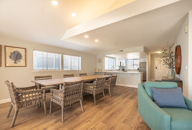 Long dining table next to living space